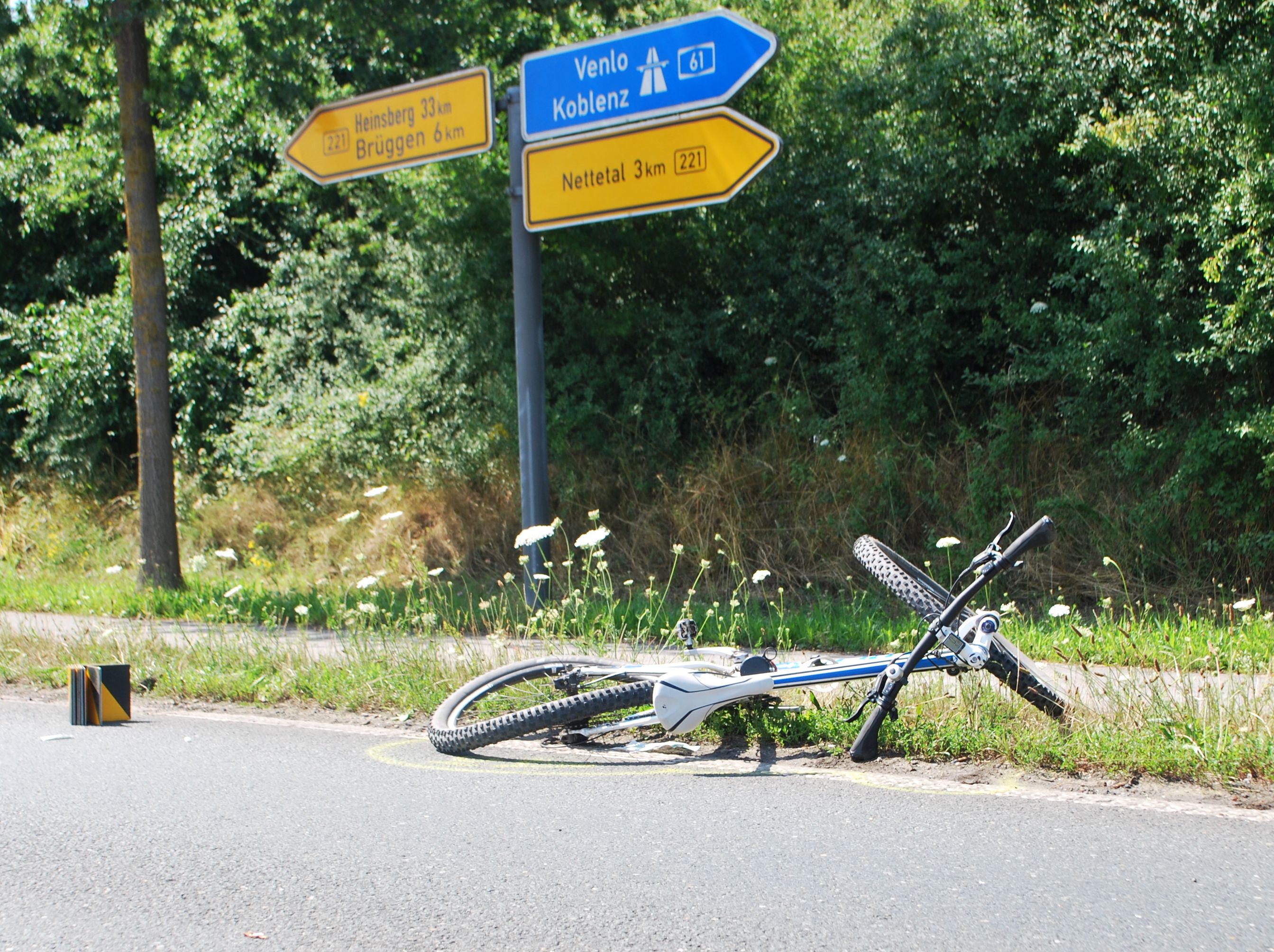 Destroyed bicycle after accident on the B221